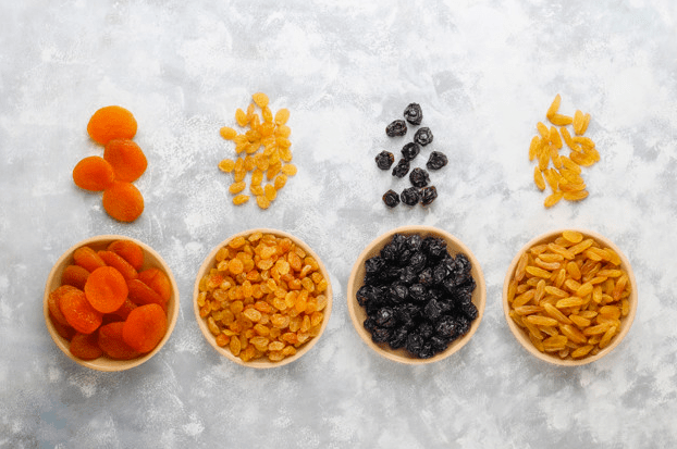 Different types of dried foods inside bowls.