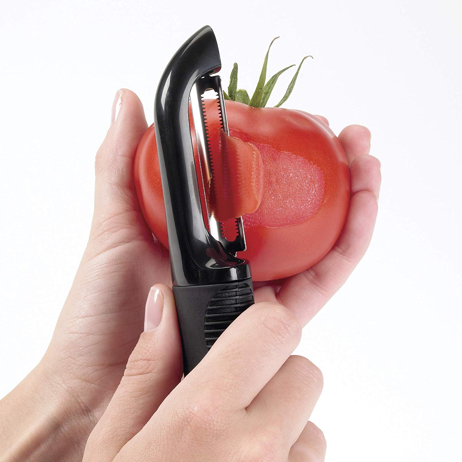 peeling a tomato using a serrated peeler
