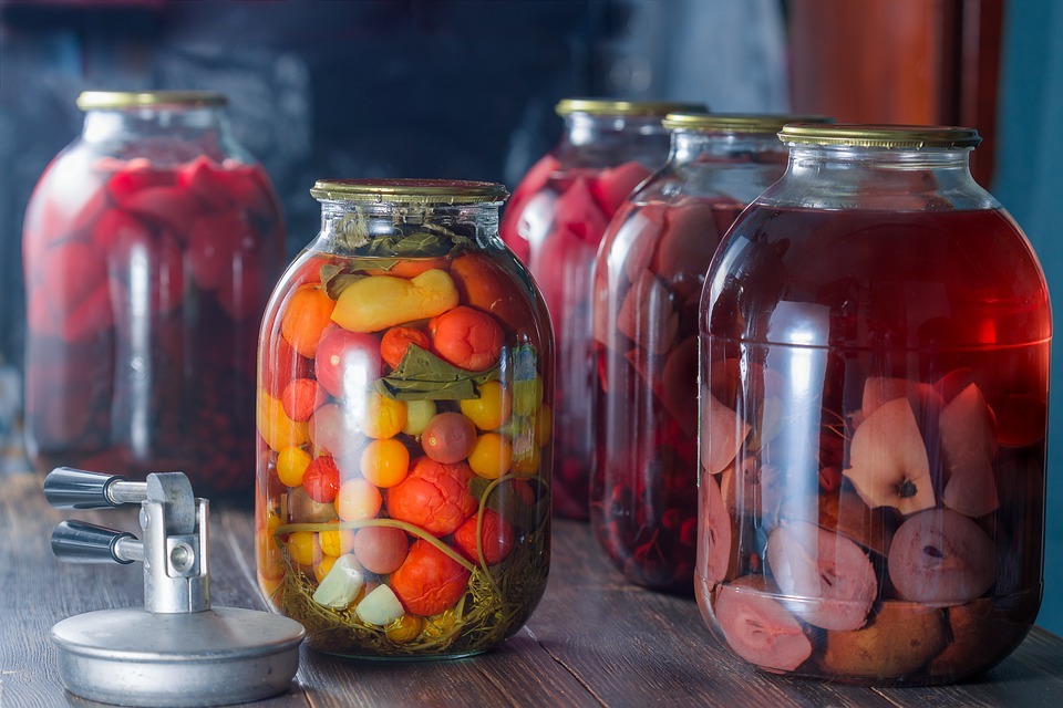 fruits and veggies in glass jars