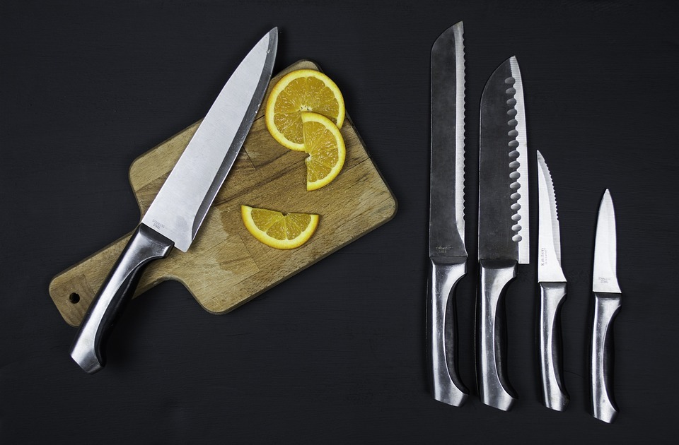 Kitchen knives on chopping board