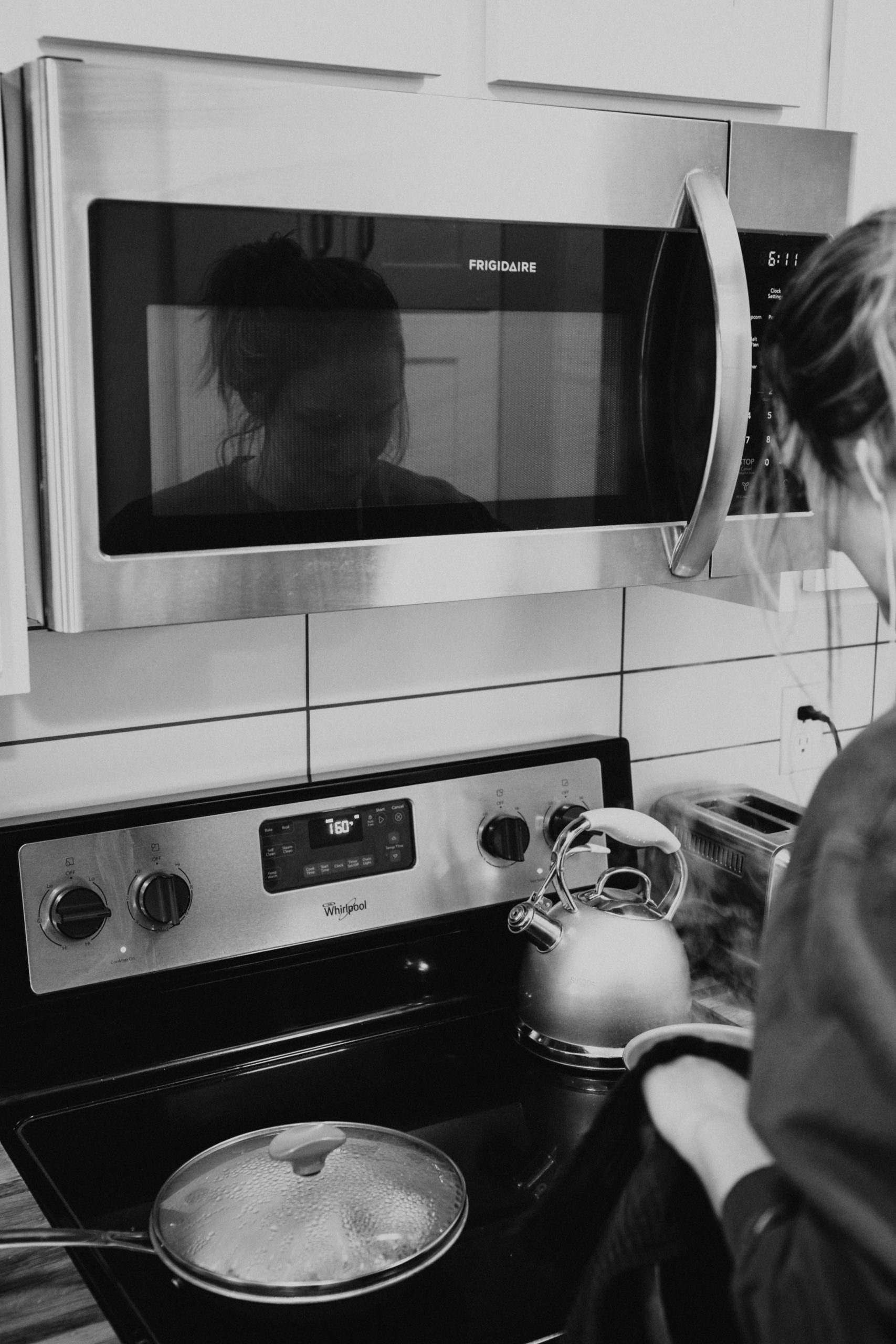 woman-near-a-microwave-oven
